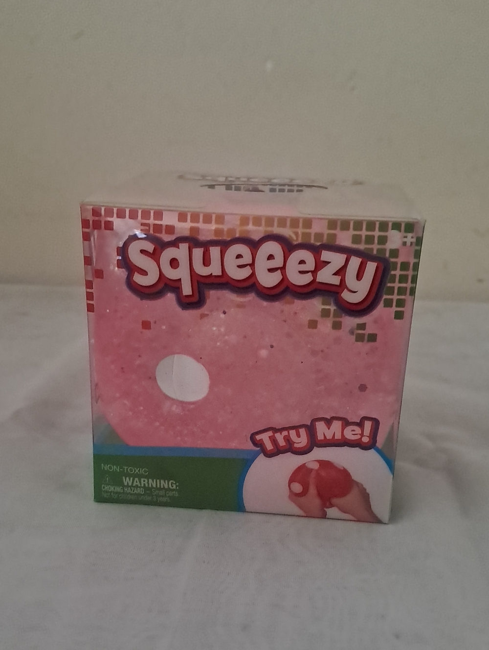 Squeeezy Pink Stress Cube Toy